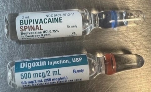 Figure 1. Examples of ampules of BUPivacaine Spinal by Hospira (NDC 0409-3613-11) (top) and digoxin by Hikma Pharmaceuticals (NDC 0641-1410-31) (bottom).