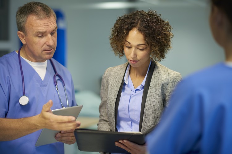 Medical staff meeting with business